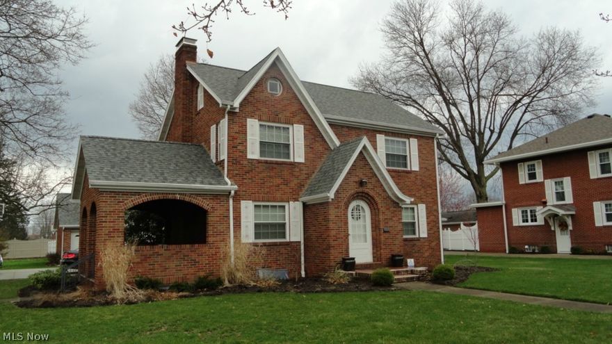 Stately 4-5 bedroom, 2.5 bath brick home.  2,830+/- square feet of living space.  Refinished hardwood floors in the living room with crown molding and a gas fireplace.  Eat in kitchen with a pantry.  Private, third floor master suite.  Finished lower level includes a possible fifth bedroom and a rec room with brick fireplace.  Vinyl replacement windows throughout.  3 new ProVia storm doors in 2013.  New roof in 2012 on the house, garage and barn.  Vinyl fenced yard.  2 car detached garage.  18 X 12 yard barn with electric.  15 X 30 above ground pool with new liner and pump in 2012.  100 X 160 level lot.  Great location, close to Tuscora Park.  Exclude stainless steel kitchen appliances, freezer in the lower level, hot tub, rose bush and refrigerator in the yard barn.  Above ground pool can be removed.