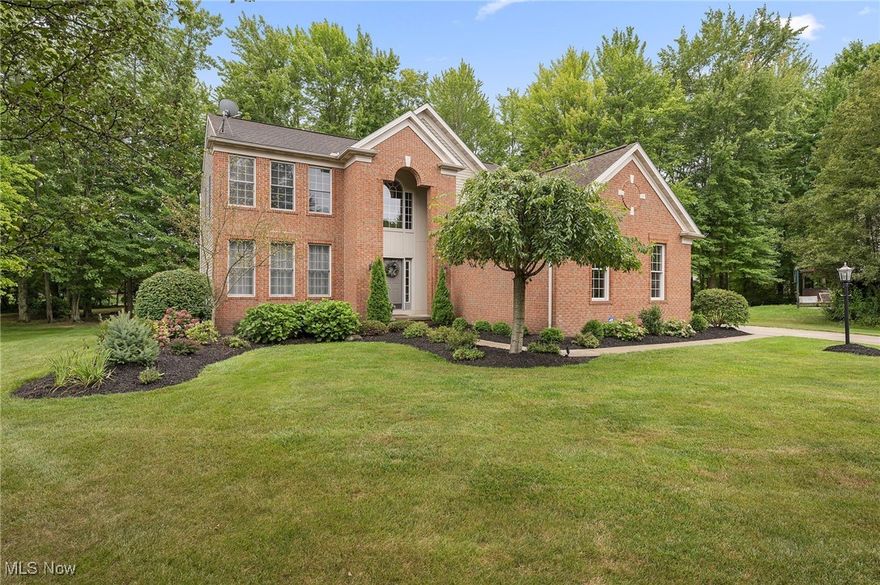 Situated in the highly desirable Ledges community on a quiet cul-de-sac, this move-in ready colonial offers the perfect blend of contemporary living with timeless charm. A welcoming two-story foyer introduces a bright, open layout designed for both everyday living and entertaining. The kitchen offers granite countertops, an island, abundant cabinet space, and an eat-in area with sliding doors leading directly to the patio. For more formal occasions, the home features a separate living room and dining room, while the spacious family room off the kitchen showcases a cozy gas fireplace and plenty of natural light. An updated half bath rounds out the main level.

Upstairs, the master suite is a true retreat with vaulted ceilings, its own fireplace, and a beautifully remodeled bathroom. The luxurious bath features heated tile floors, a stunning tiled walk-in shower, dual vanities, and a large walk-in closet, creating a spa-like experience at home. Three additional generously sized bedrooms, each with ample closet space, provide comfort and functionality. A laundry room and a well-appointed guest bath complete the second floor.

The finished basement, remodeled in 2020, adds impressive living space with a full bathroom, a large rec room, and two versatile flex rooms currently used as an office and guest bedroom. A large storage room provides plenty of space to keep everything organized.

Outdoor living is just as appealing, with a large patio and built-in gas firepit, gas grill connection, plus a second firepit area perfect for entertaining in the evenings. The expansive yard is equipped with an invisible fence, offering plenty of room for play or pets. A three-car garage with a gas heater adds both convenience and comfort to this beautifully maintained home.

Major updates include HVAC (2019), roof (2012), two hot water tanks (2015), and new carpet (August 2025). Please see MLS Supplements for the full list of improvements—there are too many to list here!