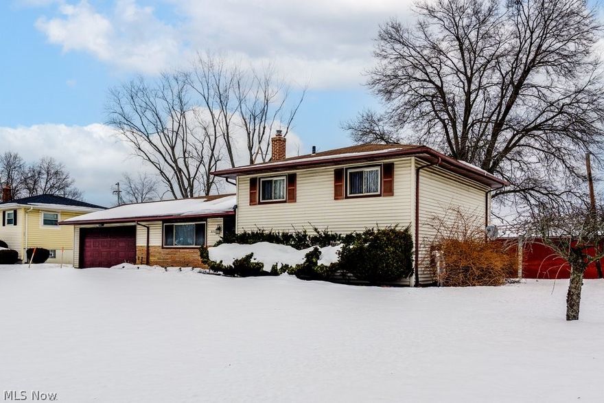 Don’t Miss your chance to own this lovingly cared for spacious home.  With over 1,500 Sqft of living space and three bedrooms and two full baths this home offers plenty of space at a great price point.  When you enter you will be impressed with the vaulted ceilings that greet in the main living area.  The living room is open to a well-appointed eat in kitchen with nice tile floors and backsplash as well as nice new stainless appliances.  Off the kitchen is an attached two car garage as well as a nice new sliding door giving access to your back yard and patio.  Going up to the second level you will find three nice bedrooms and one of the full bathrooms.  The lower level overs tons of additional flexible living space that could work as a 4th bedroom, office or recreation room.  Also on the lower level is a laundry room utility space and another nicely tiled full bathroom.  This home offers many updates some of those include; Patio Doors & Windows (2023), AC (2025), DW (2025), Refrigerator (2026), Furnace (2020) Call today for private showing.