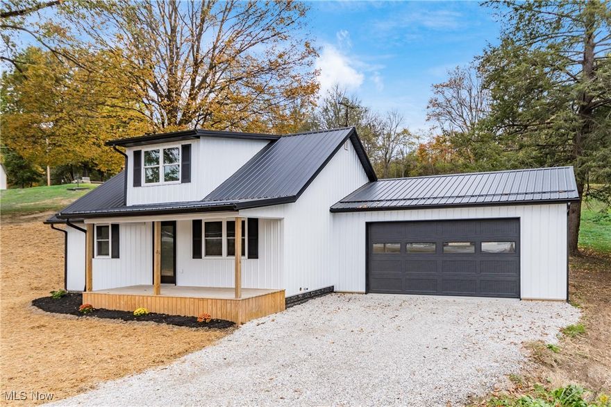 Turn-Key Beauty in East Muskingum Schools!

Step into this fully updated 3-bedroom, 2-bath home where modern comfort meets thoughtful design. This newly updated modern farmhouse offers eye-catching curb appeal with white vertical siding, a sleek black metal roof, and warm wood accents. The covered front porch, attached garage, and fresh landscaping make it a standout in today’s market.

Inside, the main floor features a bright, open-concept layout with a stunning new kitchen—complete with stainless steel appliances—flowing seamlessly into the spacious living room. Two bedrooms and a beautifully renovated full bath round out the main level, all enhanced by new vinyl plank flooring and plush carpet in the bedrooms.

Upstairs, retreat to the private primary suite boasting a generous full bath with double vanity sinks and ample space to unwind. Every detail has been refreshed: new doors, windows, vinyl siding, metal roof, electrical, plumbing, and a welcoming covered front porch. The new oversized 24' x 24' attached garage offers convenience and storage galore.

Located in the highly sought-after East Muskingum School District with easy interstate access for commuters, this home is truly move-in ready. Don’t miss your chance to own this turn-key gem!