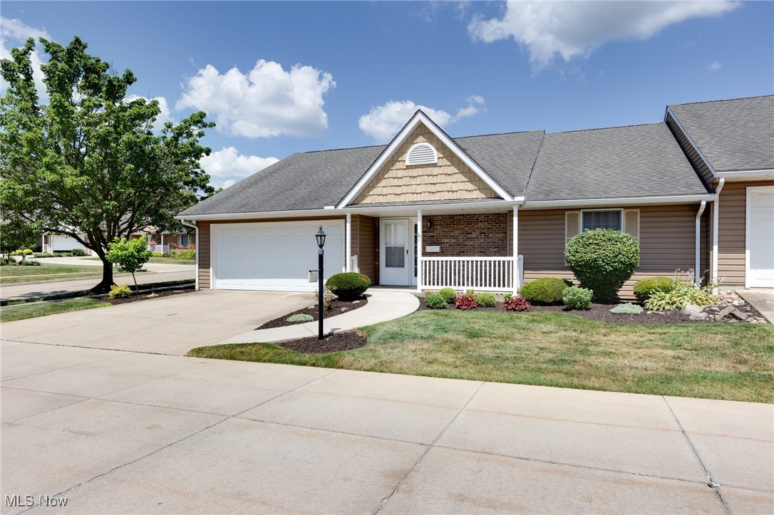 Welcome to this meticulous 2-bedroom, 2.5-bath ranch-style , low maintenance living, condo in one of Wadsworth's desirable 55+ communities. With freshly painted walls in the great room and kitchen, this open-concept layout features a spacious eat-in kitchen that flows seamlessly into a light-filled three-season room perfect for relaxing or entertaining. Both generously sized bedrooms offer walk-in closets, and the owner's suite boasts a luxurious bath with dual vanities, a jetted tub, and a separate shower. A convenient half bath is also located on the main floor. The laundry room, with utility tub, is smartly tucked between the bedrooms for ease of use. The basement adds approximately 650 sq ft of finished living space, including two carpeted bonus rooms with storage, a rec area with wet bar, and a full bath with walk-in shower ideal for guests or hobbies. There's also a dedicated workshop and plenty of storage space. Close to shopping, recreation, and major highways, and just minutes from Wadsworth's beloved community events like the Blue Tip and Hot Air Balloon Festivals, this home blends comfort, convenience, and connection.