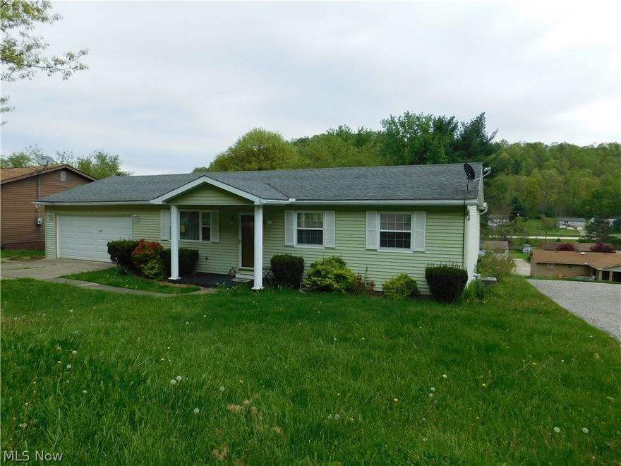Welcome Home to this 3 Bedroom 3 Bath Ranch Charmer.  Huge Master Bedroom with Master suite. Additional Family Room, Bonus Room with closet (could be 4th bedroom), Utility/Laundry room, Workshop, and large storage area on Lower Level.  New Back 30 x 10' Deck overlooks fenced in backyard. New Concrete steps that lead to the backyard are perfect  for someone wanting to put a pool up.  The 2 Car Garage has plenty of cabiinets and work space.