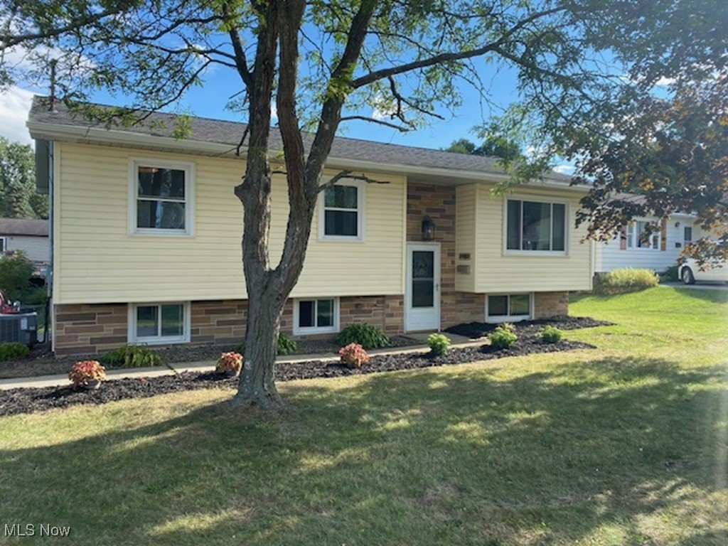 2054 sq ft of Living space. New Stainless Refrigerator, Stove, Dishwasher, and Microwave. Family room with wood burning fireplace and built-in cabinets. Premium Luxury Vinyl Tile throughout the home for beautiful and easy maintenance. Fresh paint in all rooms. Fantastic deck overlooking fenced in backyard.
