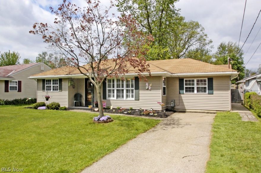 This ultra clean ranch has been completely remodeled creating a tasteful look that is sure to please. The gourmet kitchen is the perfect place for the chef in the family to cook their favorite recipes. Kitchen is complete with a golden oak finish and has been outfitted with a complete appliance package and even a newer stainless steel dishwasher and refrigerator. Kitchen is open to the breath taking great room addition which features vaulted ceilings, built in gas fireplace with full brick face and all new carpet. The large great room is perfect for quiet days and nights and more than large enough to entertain friends and family. Step through the massive light filled sliding glass doors into your new back yard oasis.  Out back you will find the hand laid custom stone paver patio, amazing landscaping, full wooded privacy fence, fire-pit and ample storage or even extra room to entertain in the massive out building! The home has newer vinyl windows and vinyl siding for a clean, neat and l