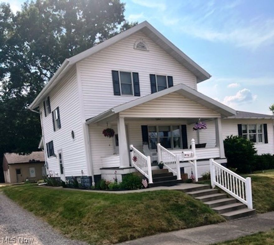Well Maintained older, 2 Story home with Master bedroom and bath on the 1st floor. 3 Additional Bedrooms and a Bathroom on 2nd floor. Larger Kitchen with bar and dining area. Downstairs bedroom could be used as a large family room.  Maintenace free exterior, lovely front porch and rear deck. Large garage in the back of the home, (44x24 Approx 1950 Sq Ft) formerly used as an upholstery shop. Updated include windows, heating, exterior and much more. This home has had the same owner for 50yrs and has been lovingly cared for. Call for a personal showing today!