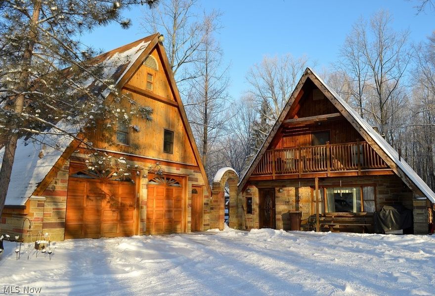 Unique property includes a separate "apartment" above heated 2 car garage BUILT IN 2005 with 1 bedroom, living room and 1 full bathroom. Both buildings have a separate hot water tank. Stocked pond with fountain. 3 bedrooms in the second floor of the main house + 2 rooms in apartment above the garage and full bathroom. 3 full bathrooms total, loft, office, den, living room, family room with fireplace, oversize kitchen, eat in kitchen, formal dining room, covered porch in the back, paver patio, two balconies off the master bedroom and guest bedroom, basement, etc. NEW SEPTIC SYSTEM INSTALLED IN APRIL 2015.