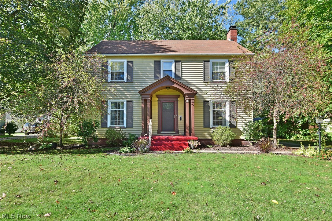This stunning Warren property delights with two floors of beautifully finished living space that showcase both scenic views and spacious offerings! You won’t want to miss this 3 bedroom, move-in-ready home, complete with a partially finished basement for even more potential living space. Bold, red stairs mark the covered entryway as the enclosed foyer displays tiled flooring that opens to reveal both the main stairway and hardwood flooring that pours into the nearby formal dining and living rooms alike. Sculpted archways divide the floorplan as the expansive living room is host to a brick-lined fireplace with a finished mantle. Sliding doors beset rear patio access that overlooks the backyard where a large shed joins the detached two-car garage. Back past the dining room, a fantastic kitchen wows with its brightly colored galley layout and unique lighting. An array of cabinets includes a large corner pantry as the hall-like layout ends with a large eat-in dining area with hidden first-