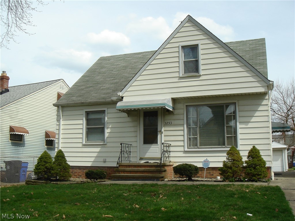 Sturdy built Bungalow with hardwood floors under the carpet on first floor. Home has been maintained but needs decorating. Nice sized eat in kitchen includes appliances. Bath was updated with a tub surround. The second floor offers a spacious 16 x 11 bedroom plus a 12x 7 sitting area and a walk in closet. Plenty of extra storage space too. Glass block windows are in the full basement. Hot water tank new in 2019, Air Conditioner new in 2023. The two car vinyl sided detached garage has an opener to make life easier! Location is convenient to the Rapid Transit and I 90. This home is ready for some new memories!
