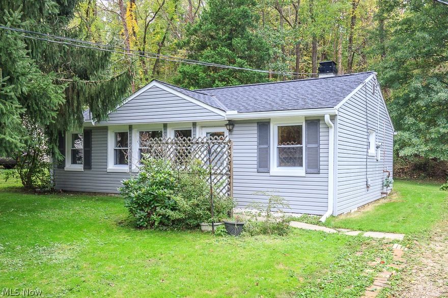 Quaint three bedroom, one bath ranch on a quiet street in desirable Kirtland. Get the most out of the space with this open concept home! Kitchen features ample cabinet space and an eat-in area. Full bath and three spacious bedrooms complete this home. Newer carpeting throughout. Laundry room has plenty of storage space. Wooded backyard with storage shed. Updates include: New roof in 2016.