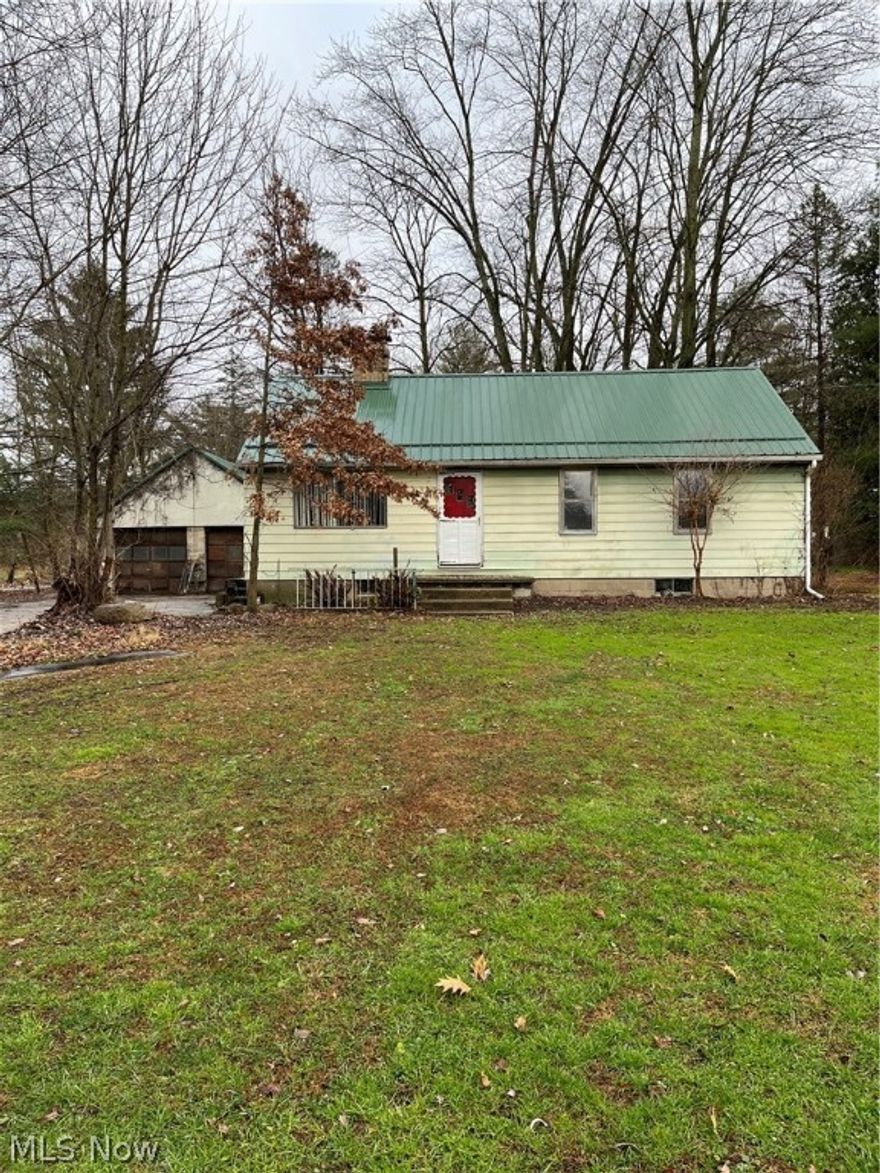 This 3 bedroom ranch is in need of work, although has much to offer. The house has a new metal roof on it and 2 car block garage. The barn on-site has a concrete pad and the property sits on over 3 acres. There is also an extra parcel (#15-00919 with 6.2 acres) contiguous to the rear, which can be purchased separately.