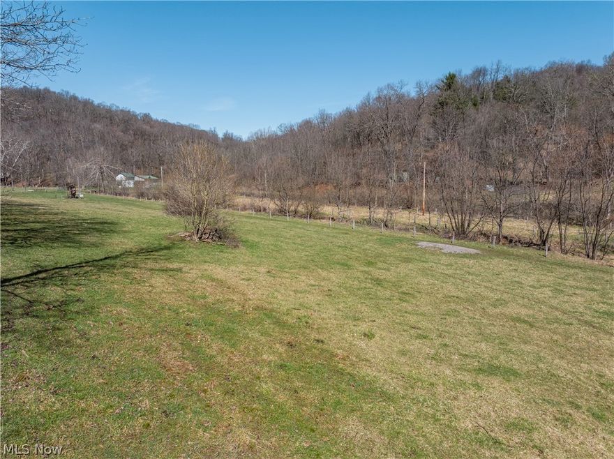 Live Auction 5/02/2026 10:00 AM - Parcel 4: 38.08 acres w/ 470’ frontage -This exceptional 188-acre offering of Holmes County land presents a rare to the market opportunity to own real estate in the well-known Stillwell area. Located just seconds from a paved road, the land features an older 3BR 2BA home, a 35' x 56' pole building, private septic, and a spring-fed water supply. The setting of the home offers peace and quiet, privacy, and ample land for gardening or animals. For the hunters, this property is situated in one of the county’s most sought-after hunting areas. Stillwell is well known for its hunting, and this property is no exception. Lots of deer trails, rubs, and scrapes, and each parcel is accessed from the east, providing favorable prevailing wind access and multiple ideal locations for food plots. A well-established trail system runs throughout the property, providing easy access. There is a nice ridgetop that spans most of the property, while the remainder of the land has a nice roll to it with a strong running creek, tons of road frontage, fenced pasture areas and ample building sites throughout. Most of the harvestable timber has already been marked and sold; these trees will be removed following the sale and are not included in the transfer. This selective harvest is expected to enhance the wildlife habitat and improve access with additional trails, bedding/cover, and browse. Whether you’re searching for a peaceful building site, prime hunting land, pasture ground, or just an investment, this property offers endless potential.
