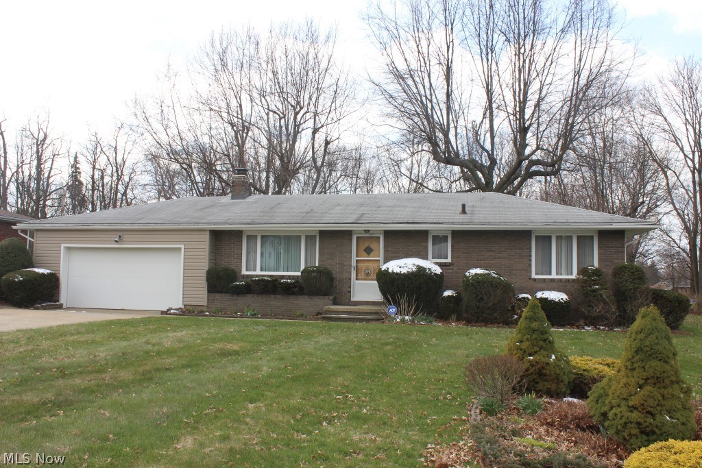 Wonderfully cared for & maintained 3 bedroom, 1.5 bath ranch centrally located in City of Green; close to shopping, schools, hospitals, library and parks on .58 acre level lot* Living room has a unique brick wall- possible location for a fireplace- & hardwood floors under carpet* Sitting room off kitchen/eating area with slider to patio* 3 bedrooms with wood floors, light and bright with oversized windows (master with half bath)* Poured basement walls* Glass block windows (3/2014)* Other improvements, including but not limited too: burner top, hood & bathroom faucets (2016), siding & painting of windows (2012), paint eves, spouting & all screens (2010), hot water heater (2011), shingles (single layer), built in over & refrigerator (2007), sump pump with battery back up, cement cap on chimney* Kitchen appliances stay (refrig, over, burner top) and dryer* Attached 2 car garage 20x24 with opener & service door* Space guard air cleaner* Water softener* Retro bathroom in excellent condition