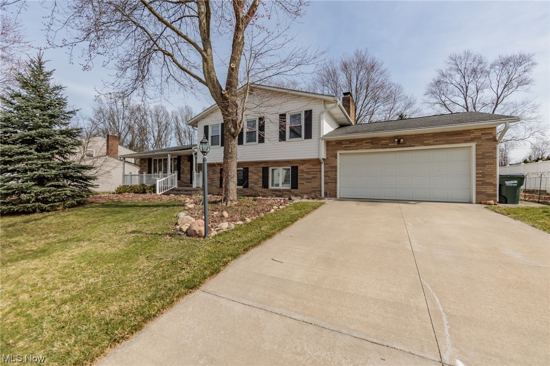 This spacious 4-bedroom split-level home boasts 2.5 baths and an inviting open floor plan with vaulted ceilings. Numerous updates have been made to enhance its appeal, including a newer oven, updated bathroom, and the installation of AC in 2023. The electrical panel has also been upgraded for added convenience .Entertain guests or relax with family in the cozy family room featuring a fireplace, or unwind in the sunroom which adds a touch of natural light and charm to the space. The large living area provides ample space for gatherings and everyday living. Conveniently located in a central area, this home offers easy access to amenities and attractions, making it a desirable option for those seeking both comfort and convenience. With its many nice features and prime location, this home is sure to please.