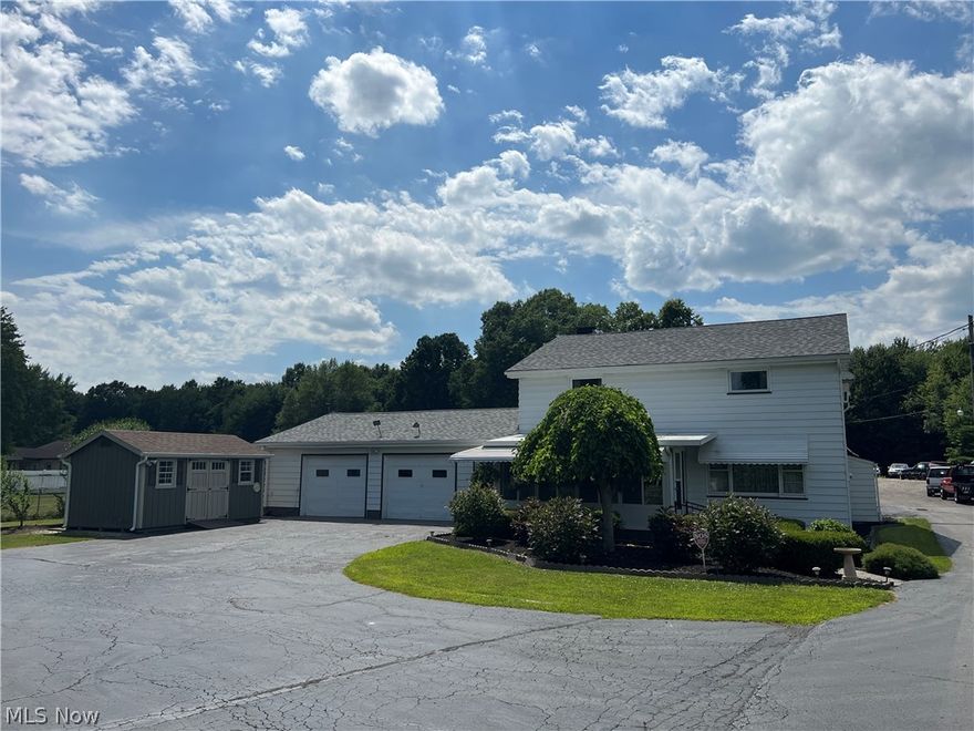 Amazing opportunity! 4 bedroom 2 bath home close to walking trails to Craig Beach, and across the street from Olde Dutch Mill Golf Course. Could be used as a large vacation rental. In the rear of the property is a fully functioning garage (business Not included in sale) with 6 bays, 4 lifts, as well as other tire shop equipment, and is currently Vanguard Full Service Auto. Whether you are looking for a commercial rental space or to start a business of your own, or just room to wrench on your own toys this is it. Home features hardwood floors throughout the living room and bedrooms and has a heated and air-conditioned attached 2 car garage of its own, featuring a full kitchen. New roof on the house and attached garage in 2021, lots of maintenance documentation. Bring your tool box and your golf clubs and take a look at this one today! Lake Milton, Ohio’s 72nd State Park. Amphitheater, beach, swimming, fishing, boating, walking and jogging trails plus golf, wineries and shopping.