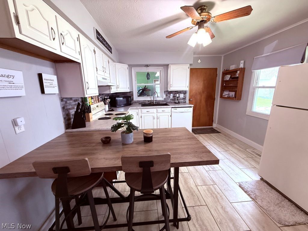 Photo of 270 E Ralston Avenue, Akron, OH 44301 (MLS # 5207446)