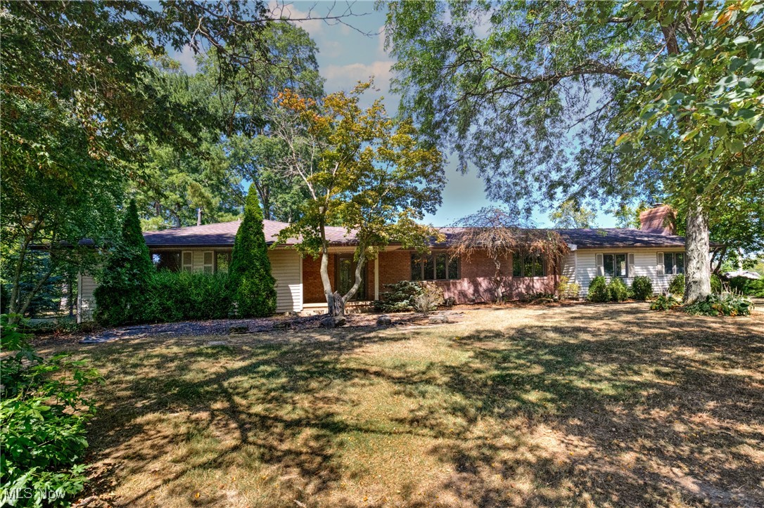 FEEL LIKE YOU ARE ACTUALLY INSIDE THIS HOME! WALKTHROUGH THE 3D VIRTUAL TOUR OF THIS PROPERTY BY CLICKING THE LINK.
Welcome to 3770 Fairway Drive in Canfield, a stunning and expansive ranch home located in the desirable Canfield School District. This incredible property offers 5 bedrooms, 5 full bathrooms, and 1 half bathroom with over 4,500 sq. ft. of living space, making it the perfect home for bot h everyday living and entertaining.
The main level features a huge kitchen designed for the chef at heart, complete with a commercial-grade stainless steel refrigerator, high-end countertops, island with seating, commercial stove, and oversized commercial hood. With tons of cabinet storage, two dining rooms, and a sitting room/parlor, there’s no shortage of space for gatherings. The large living room includes a built-in bar area, creating a warm and welcoming place to relax or entertain.
The primary suite is truly impressive, offering a changing area, walk-in closet, and private bathroom designed for comfort and convenience. Additional bedrooms are generously sized, each with their own bathrooms, giving everyone in the household plenty of privacy. A first-floor laundry adds to the practicality of the layout.
Step outside the back doors to your private entertaining oasis. The spacious deck with a massive pergola, mounted flat screen TV, and plenty of room for seating makes this an ideal space for outdoor living. A 4-car garage with a large driveway ensures more than enough parking and storage.
The basement adds even more possibilities, with a full bathroom, tons of storage, a mirrored workout room, and an additional lounge/hangout space. All of this is located directly behind Tippecanoe Country Club, offering a scenic and highly sought-after setting.
This home truly has it all—space, luxury, and functionality—and is ready for its next owner to enjoy!