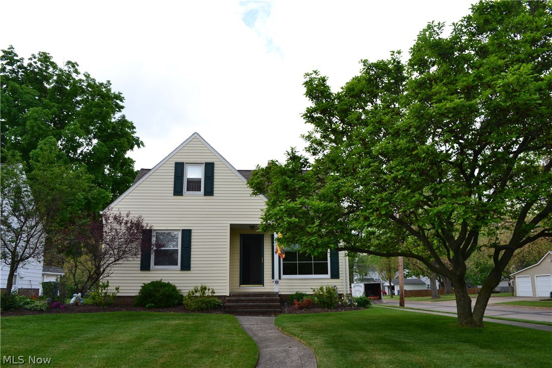 Not your typical bungalow. The openness of this home is like no other around offering a large, eat-in kitchen with hickory cabinets; dining room; step down to a very open, spacious family room with a wood burning stove. Walk in from the 28x22 heated garage onto a beautiful ceramic floor. Also a convenient first floor laundry room. Beautiful composite deck off family room. A full basement, partially finished, compliments this home. Spacious master bedroom upstairs with 2 closets; one is cedar lined; attic storage and 1/2 bath. All situated on a 50x225 lot complete with above ground pool, composite deck and 16x10 Amish built shed to match the house. Fresh, clean and ready to move right in.