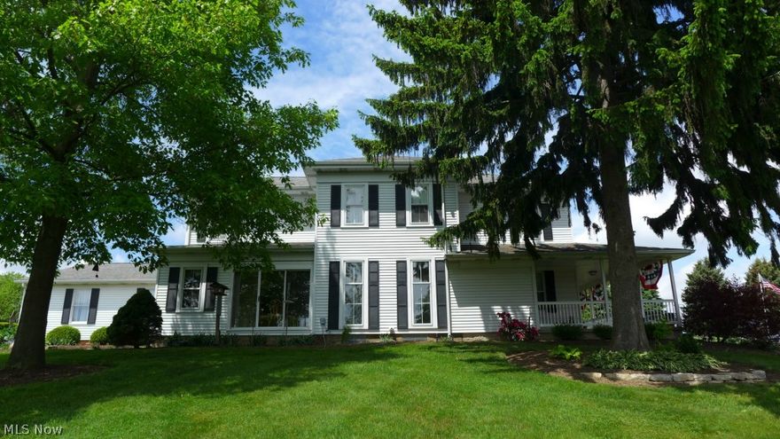 Picturesque 57 acre farm in Lake Township. Restored and updated Farmhouse featuring 4 bedrooms, 3 1/2 baths, updated kitchen and attached 3 car garage. Wrap around porch overlooking gardens and fields. Other buildings include: 14 stall barn, smoke house, 2 corn silos, play house and efficiency farm office building with kitchenette and bathroom, a great place for a live-in relative. All of this in a pastoral setting that has to be seen to be believed. Plenty of possibilities with this fine property. Seller will subdivide acreage.