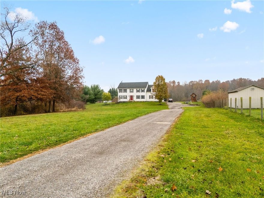 Welcome to this beautifully crafted 5-bedroom, 2.5-bath home nestled on 4.7 private acres. Set well back from the road, this custom-built home offers space, comfort, and quiet country charm. With 2x6 construction and extra insulation, it's built for long-lasting quality and energy efficiency. Bring your horses! The property features a 2-stall barn with partial fencing—ready for your four-legged friends. Inside, you’ll find a spacious great room with a cozy wood-burning fireplace (with gas logs), open to a kitchen that boasts granite countertops and plenty of space for cooking and entertaining. On the main-level you'll find a room that can serve as a formal living area or a home office and upstairs, a charming loft provides the perfect spot for reading, studying, or relaxing. All five bedrooms offer generous space, and the home includes a convenient first-floor laundry room. The full 10-course block basement is ready to be finished, offering room to grow or customize. Step outside to enjoy the expansive back deck overlooking the countryside and woods ideal for peaceful mornings or evening gatherings. All appliances stay, making this move-in ready. Whether you’re looking for a hobby farm, a peaceful retreat, or a spacious home with room to roam, this one has it all. Come experience the beauty, space, and possibilities this property offers. Above ground pool is about 2 years old. Roof was replaced in 2021