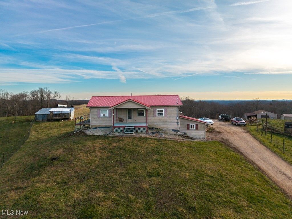 Photo of 360 E Henniger Road, Lowell, OH 45744 (MLS # 5176008)