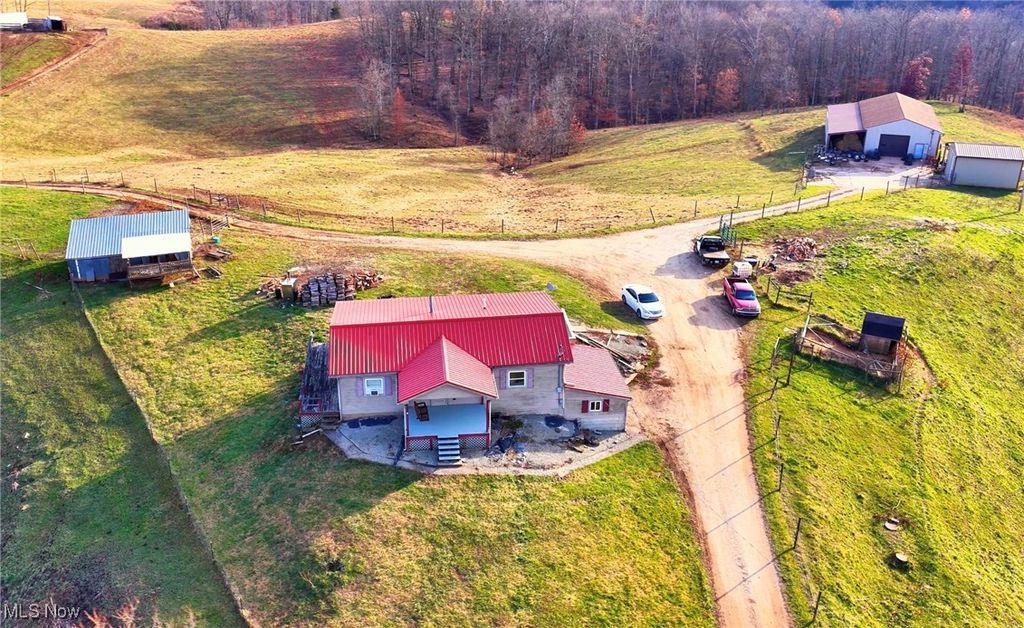 Photo of 360 E Henniger Road, Lowell, OH 45744 (MLS # 5176008)