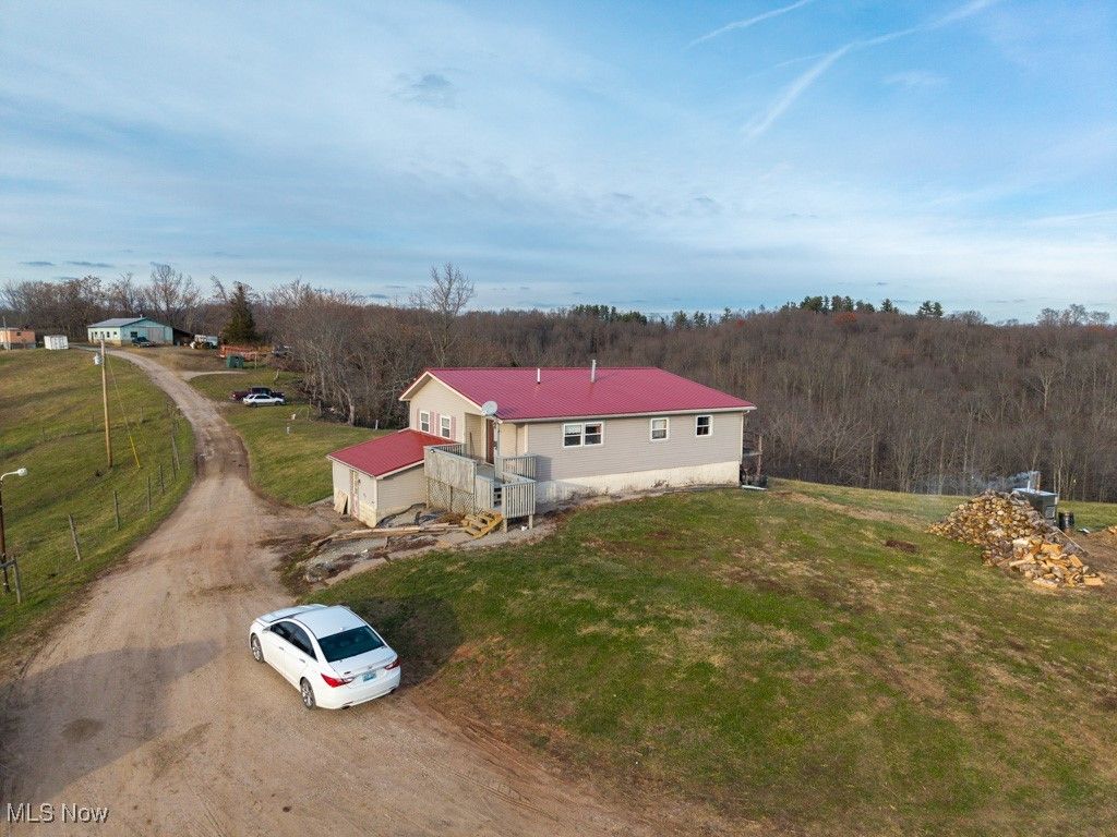 Photo of 360 E Henniger Road, Lowell, OH 45744 (MLS # 5176008)