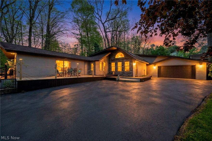 Welcome home to 1361 Main Street, a STUNNING ranch with incredible architecture and completely updated with impeccable taste! Pull in & fall in love with the large wrap around deck and perfectly manicured landscaping; the perfect spot to relax after work! Step inside & be blown away with the beautiful craftsmanship throughout. The family room features vaulted ceilings with a focal quartz ventless gas fireplace with subway tile & accent lighting under shelves (2021). The full bath was recently updated (2021) featuring luxury Versace wallpaper, Italian marble & a custom hickory vanity. The eat-in kitchen features gorgeous tile floors, corian countertops and an abundance of cherry cabinet space. The front living room gives you the additional space for a home office or recreation/playroom. The laundry room was redone (2021) with a focal shiplap & storage closets. The master suite is EXCEPTIONAL- featuring a huge walk-in closet with built-ins, vaulted ceilings & master bath featuring new choreograph shower wall & duel sinks. A bedroom & plenty of closet space complete this ranch. The 2 car garage is fully heated and cooled; great for hopping in your vehicle during any Ohio weather. The backyard features gas ran for outdoor firepit, privacy fences, shed & outdoor living space. Updates include new Pella windows ('16), new roof ('16), carpet ('19), resurfaced asphalt driveway (18') tankless water system (2018) & more! This home is minutes from shopping, highway access, restaurants, lake and more! This home is a must see! Call today to schedule your private showing!