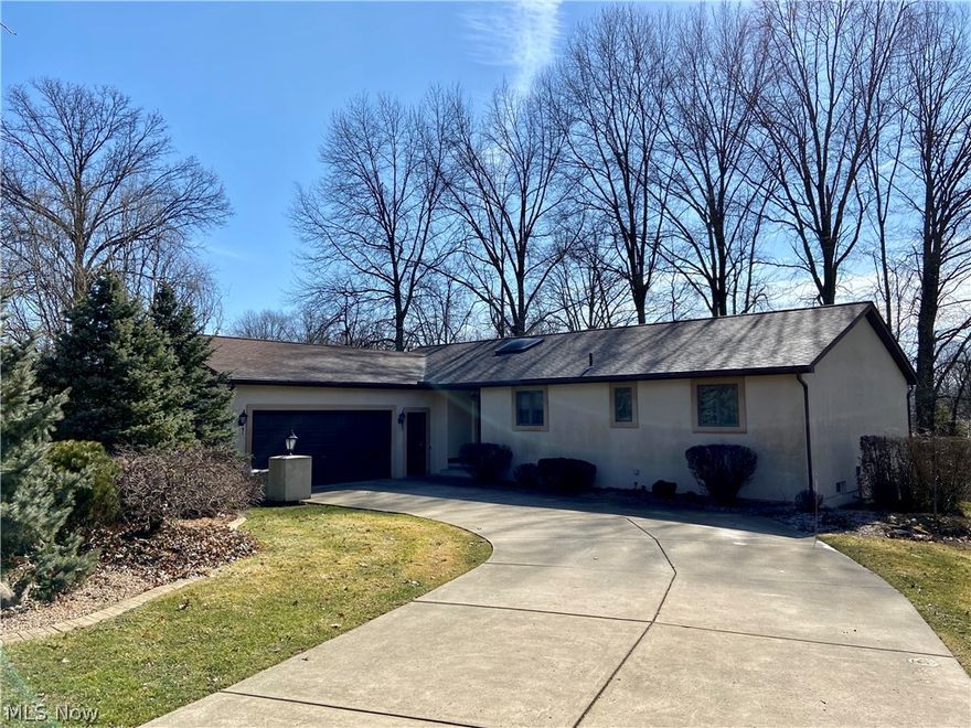 Perfectly located in a quiet cul-de-sac in one of Niles' most sought-after neighborhoods, this lovely 3 bedroom, 3 bath ranch has so much to offer. Highlights include a vaulted entryway with skylight, extra large living room, formal dining room, spacious eat-in kitchen with plenty of cupboard space, master bedroom with walk-in closet & attached bath, full walk-out basement and over-sized garage. The backyard offers a large wraparound deck, ample lawn space, storage shed (or adorable playhouse) and mature trees for privacy. If you've been searching for a house that provides easy one-floor living in a peaceful setting, this is the one for you!