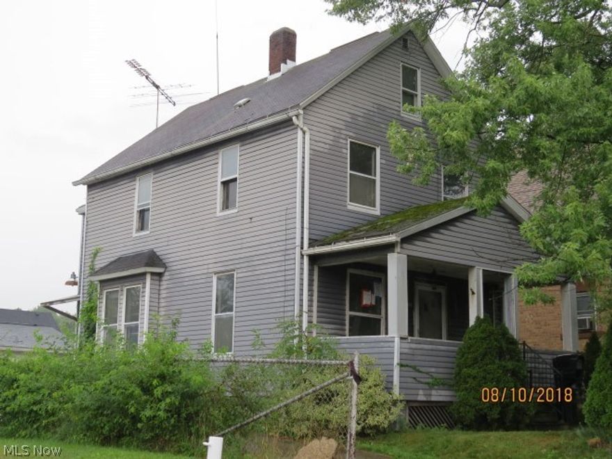 Spacious colonial, perfect for investor or make it home.  Oversized 2+ car garage for car buff or extra storage.  Large rooms throughout, original woodwork in most rooms, some wood floors.  Full basement.