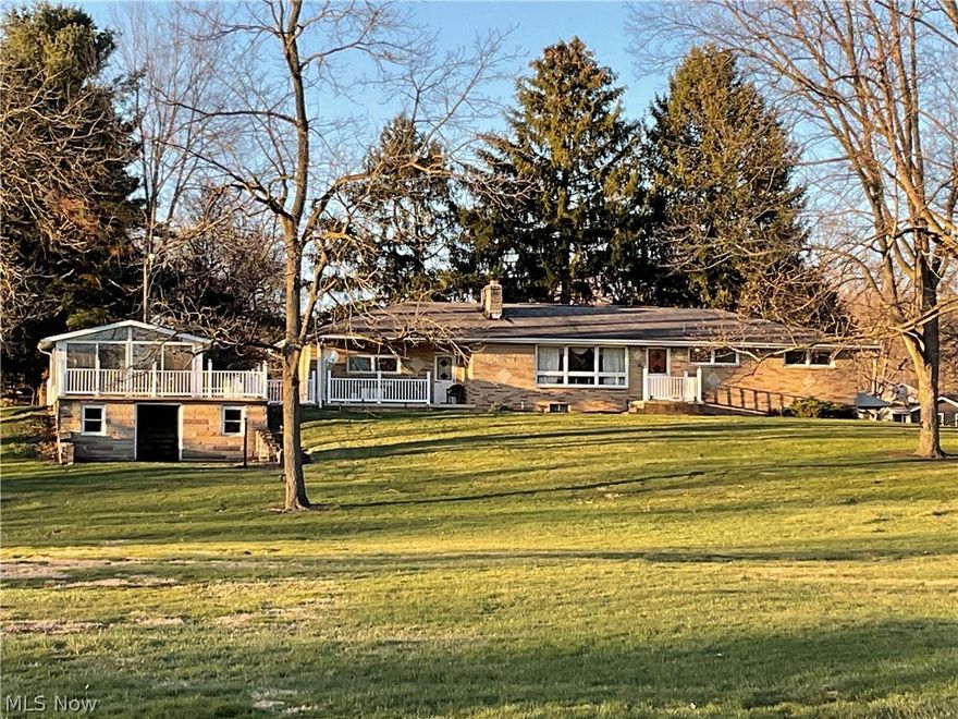 Brick ranch home situated in Perry Twp. on 2.31 acres with naturistic views features carpeted living room w/ stone wood burning fireplace, applianced kitchen w/ natural wood cabinets - stove - fridge - dishwasher, dinette, master bedroom w/ lighted closet & water closet, 2 additional bedrooms, ceramic tile full bath w/ dual sinks & / tub & shower, outdoor sunroom & patio overlooks the 2.31 acre yard for entertaining and those relaxing evenings, full walk-out basement w/ finished rec. room w/ fireplace & 2nd applianced kitchen, ceramic tile full bath, newer FA gas furnace & central air, 200 amp breaker electric service, laundry room, elec. water heater, 2+ car garage w/opener, concrete drive, built in 1960, taxes $1457.74 per half year. Home in need of updating & renovating, so finish & remodel to your liking. This home sells to the highest bidder at Absolute Auction so come and bid your judgment.