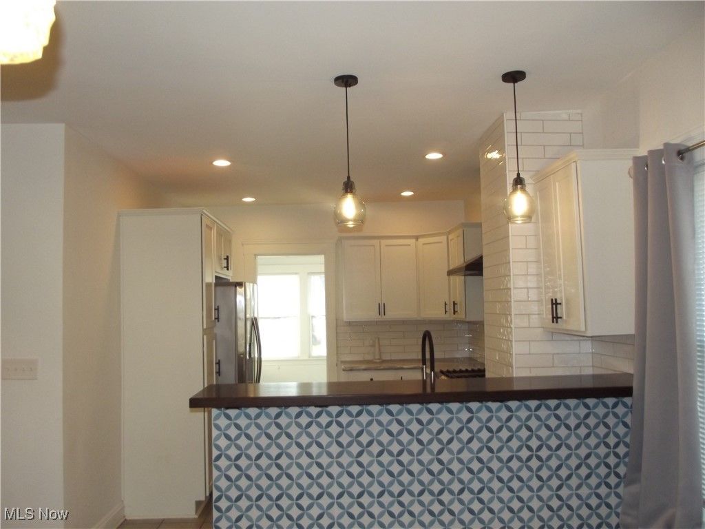 Photo of 10918 Ashbury Avenue, Cleveland, OH 44106 (MLS # 5178468)