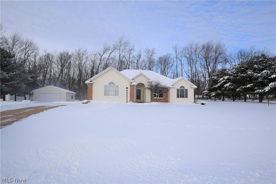 Beautiful 3-bedroom, 2-bathroom home in Uniontown with numerous updates throughout. The kitchen is up-to-date with gorgeous vinyl floor, white cabinets, stainless steel appliances, and a clean tiled back splash. The kitchen island offers additional counter space. Right off the kitchen, there's a bonus room perfect for a kitchen table or a lounging area. This room has a door leading to the cement back patio, detached two-car garage, and fire pit (recently built in 2015). Off the kitchen you'll also find the convenient first-floor laundry room and a dining room. The living room is spacious with a gorgeous Cathedral ceiling and a fireplace. The master suite located directly off the living room has its own recently updated bathroom and walk-in closet. Newer clean carpet throughout home. This home has a must-see basement -- the open floor plan makes it perfect for entertaining. You don't want to miss out on this home!