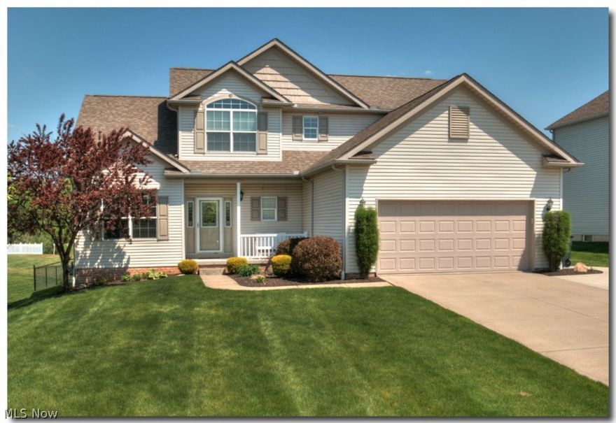 Rare find in Wadsworth! Well maintained 4 bedroom, 2,226 sq. ft. colonial with open floor plan! First floor
features a welcoming foyer with hardwood floors, leading to a 2 story great room with natural stone gas log
fireplace; formal dining room; spacious kitchen with eating area overlooking great room; half-bath and huge
first floor owner's suite with glamour bath! 2nd floor features 3 additional oversized bedrooms each with
roomy closets and ceiling fans and an additional full bath. Fully finished basement adds an additional 1200
sq ft. of living space (approximate) including a rec room with bar and half bath! Enjoy summer evenings on
the deck overlooking your fully fenced backyard adjacent to a large open space with vineyards - truly a
unique setting!