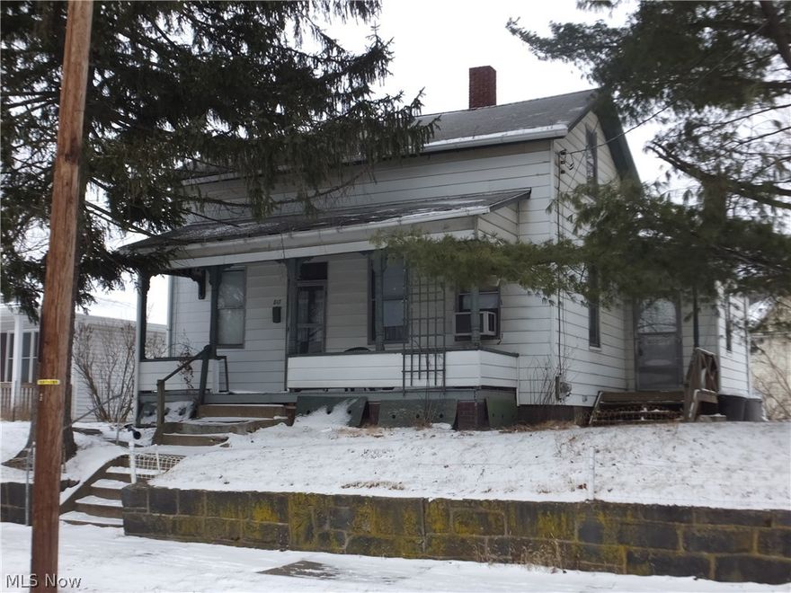 Downstairs remodeled.   1 Bedroom down, bathroom with shower, laminate floor most rooms downstairs (living room, foyer & bedroom).