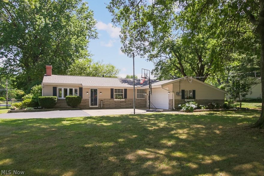 All American BEAUTY!! describes this Wonderful One-Floor Living Property!! This Sparkling Ranch-Style Home gleams w/bright, inviting Living Spaces!! The charming Entryway leads to the Handsome Great Room w/ Soaring Ceilings & Radiant Brick Woodburning Fireplace! Pretty, Sun-filled Eat-in Kitchen where everyone can gather featuring Today’s Preferred White Cabinets fully equipped w/All Appliances! You’ll love the Sliding Glass Doors to the Large Relaxing (Resurfaced) Deck 2021! Fresh Interior Paint & Newer Laminate Flooring 2019 & Carpet 2016! Pampered Bdrms & Sparkling Baths! Main Bath Renovatd 2019! Owners Bdrm Suite w/Private Bath & Walk-in-Closet you’ll Adore….your own Oasis! The almost 3/4 Acre Lot is a Nature Lovers Delight & picturesque, perfect place to unwind & ecape the Day!! Garden & Play Space… Grilling & Marshmallow Roasting all in your own Fenced Yard! Lush, Gorgeous Perennial Flower Beds surround the home w/ stunning colors & allure!! +Front Window Boxes & Attractive Brick