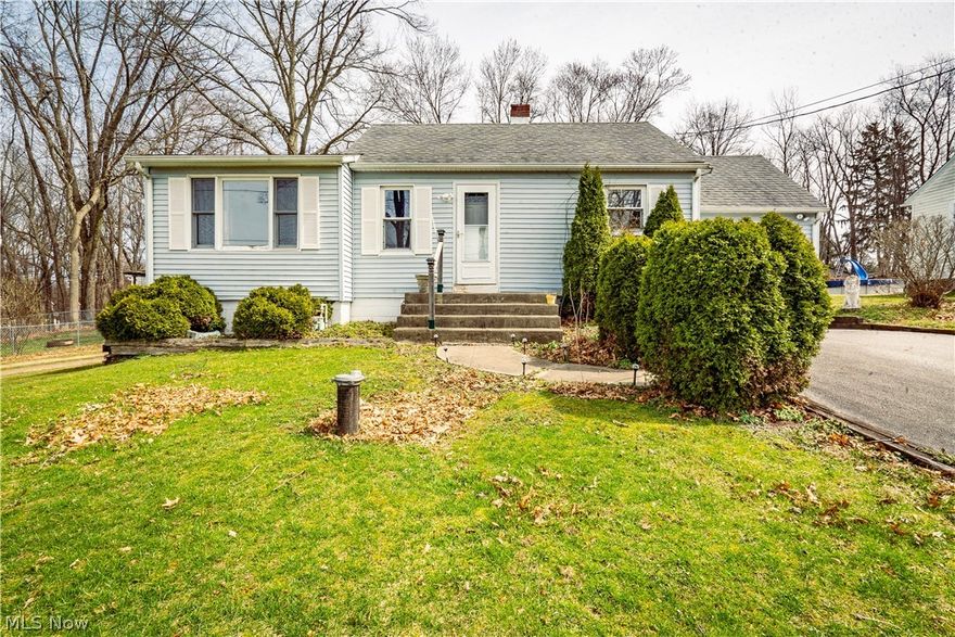 Ready for its next owner, this lovely ranch home features two bedrooms, a full bath, and a finished lower level! As we step into the home you are met with the spacious living room that has newer wood laminate flooring that can be found all throughout the home plus you'll find a double closet and a lovely picture window. The kitchen offers you tile flooring, laminate counters, and newer cabinetry. Plus the appliances do STAY with the home! Right next door is the dining area that has beautiful french doors that lead to the back deck. The bedroom on the main floor is wonderfully sized and has a double closet. Completing the first floor is the full bath that features a single vanity with storage underneath. Additionally, you'll find tile flooring and a shower/tub combo! You'll love the lower level! The family room has more laminate flooring plus the entertainment center STAYS! The second bedroom has overhead lighting, a double closet, and an egress window. Lastly, we have the laundry room