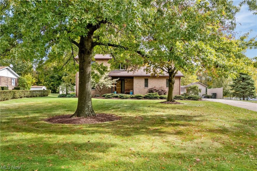 NOW... Look at THIS! Situated on over an acre in Louisville, this 3 BR, 1.5 bath w/additional shower in the lower level, pristine, custom built, one owner home is the Unicorn you've been waiting for. Fabulous bamboo flooring throughout the first floor. Bathrooms have gorgeous cork flooring. Updated kitchen has unique Schuster cabinetry with custom German imported glass accents, quartz countertops, reverse osmosis system, and newer appliances. Kitchen leads to the great room with a wood burning fireplace and vaulted ceiling. The backyard has all your wants and needs including 2 sheds, a playhouse and woods at the back of the property leading to a creek. Lower level is finished with a wet bar, huge walk-in shower, laundry area and 2 sump pumps. Washer and dryer stay. Roof 15 yrs, HWH 2021, New High Efficiency Furnace 2021, A/C unit 2019, 275 Gallon Oil Holding Tank New 6/23, New Fireproof exterior door 8/23, hot and cold water in the garage. Whole house fan. 200 amp electric. glass block in LL. Unicorns are REAL!