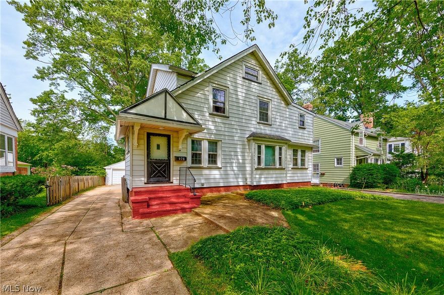 This 4 bedroom Colonial on a nice, quiet street in Cleveland Heights has a ton of potential. This home has great curb appeal, mature trees and a spacious deck that feels like an extension of this home. The living room boasts hardwood flooring & a fireplace. The formal dining room features beautiful built-in cabinets & hardwood flooring. The spacious eat-in kitchen has plenty of space to enjoy casual meals and food prep. Enjoy the oversized fenced in back yard, perfect for all of your entertaining needs. The many updates include: furnace and A/C (2017), driveway and windows (2016), paint, carpeting and kitchen to name a few. Home is being sold as is. Buyer to assume POS.