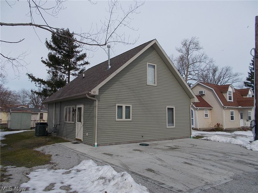 Lake front association with 10 ft. wide concrete road to beach ideal for four wheeler s or launching jet skis or just a casual walk  to beach. Common covered pavilion for picnics. Private road. Amish built home. Concrete parking for this home.
Home is 10 years old. It features two bedrooms  up with a balcony in one of the bedrooms to view lake Erie. first floor bedroom and laundry room. Large living room  with access to rear patio for cook outs. Come enjoy  spring ,summer and fall by lake erie .Or winter if desired as the gas forced air and electric back up heat furnaces will keep you warm.Appliances and contents negotiable.