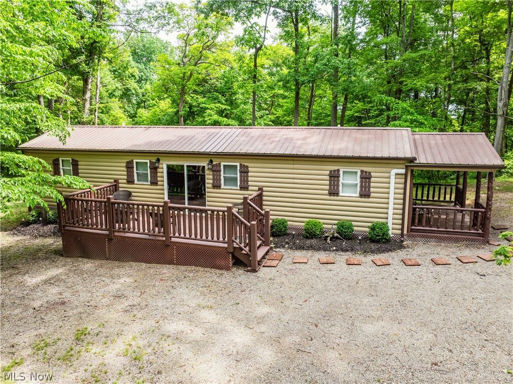 Photo of 5674 Pleasant Valley Rd RD, Nashport, OH 43830 (MLS # 5217390)