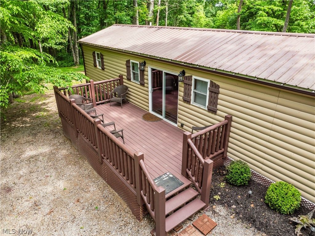 Photo of 5674 Pleasant Valley Rd RD, Nashport, OH 43830 (MLS # 5217390)