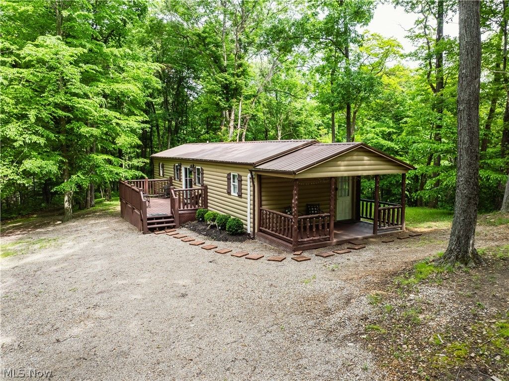 Photo of 5674 Pleasant Valley Rd RD, Nashport, OH 43830 (MLS # 5217390)