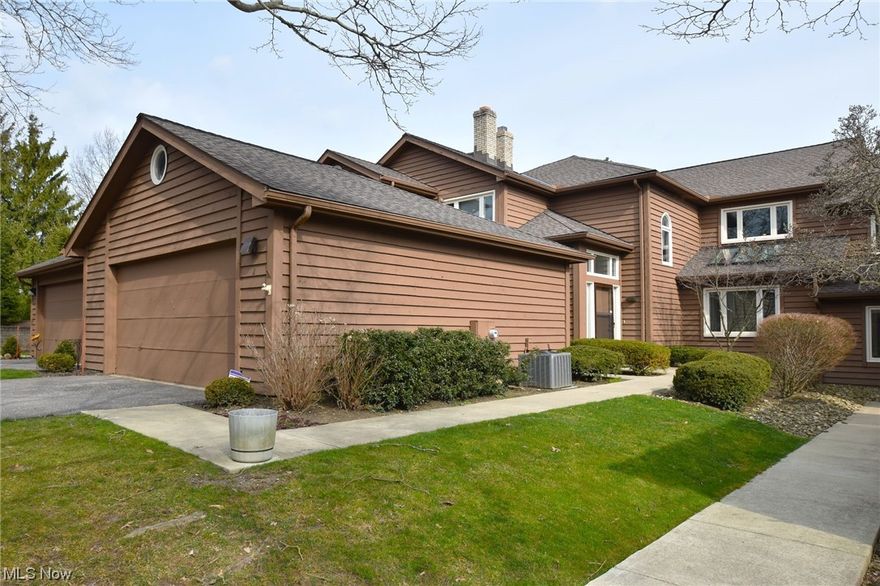 Very special light & bright condo in The Village! Quality surrounds this beautiful home. Luxury first floor living with additional bedrooms, a full bathroom and sprawling loft upstairs. The large white kitchen has loads of cabinets, expansive counter space and a large  breakfast room. First floor laundry room with storage. The spacious dining room opens the the living room with vaulted ceilings, a beautiful fireplace wall, and a wall's of glass with access to the oversized private deck & lovely views. The fabulous owner's 1st floor suite features walk in closets and a large glamour bath. Loads of storage.Amazing closets everywhere! The Village offers walking paths around the lake, tennis & pickle ball courts, pool, exercise center & beautiful party room. You are a stone's throw from Legacy Village, LaPlace, so many restaurants, Trader Joe's, Whole Foods and more. Close to freeways, Hospitals and Universities.