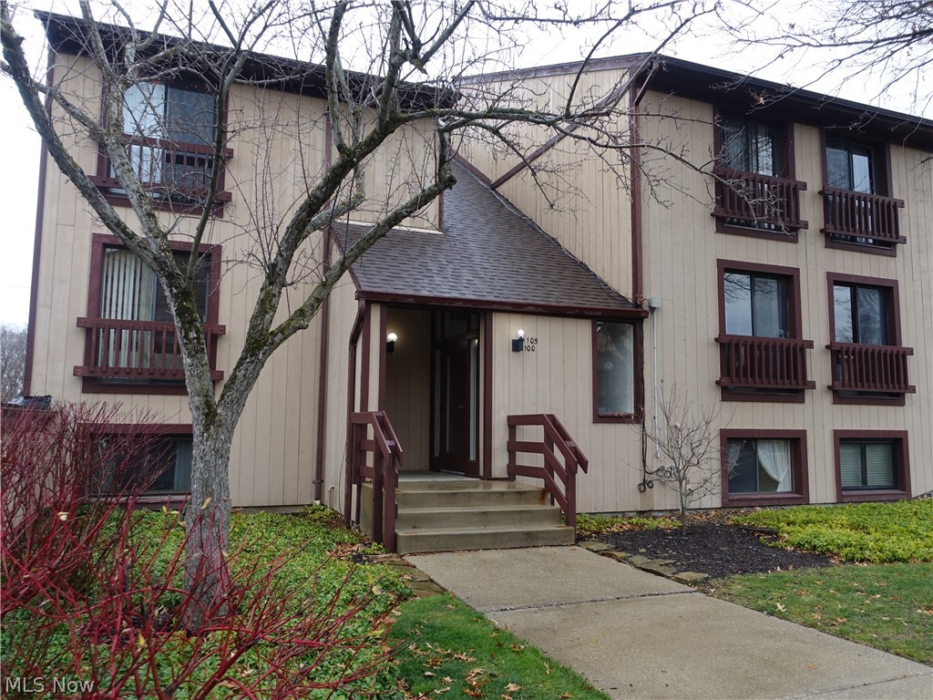 An incredible opportunity to own an end unit, which is stylish and offers tastefully selected updates! Spacious great room offers sliders to a large deck and features lovely views of the sunrise, sunset, and tree line. Kitchen has plenty of cabinet and counter space, and includes stainless steel refrigerator, dishwasher, and stove vent that are 5 years young. This condo features authentic vintage hardwood floors throughout from a dance studio so they are filled with character and memories of music and dance. Both baths have been updated to include new vanities, commodes, lighting, mirrors and flooring. The main bedroom is spacious and offers a full, updated bath and huge 9' x 6' walk-in closet. This condo also includes it's own private laundry (washer and dryer convey) and 1 car garage! Lots of closet space for all your treasures. Location is perfect with close proximity to shopping, restaurants, Rt. 271/Rt. 8/Ohio Turnpike and the Cuyahoga Valley National Park. Condo amenities inclu