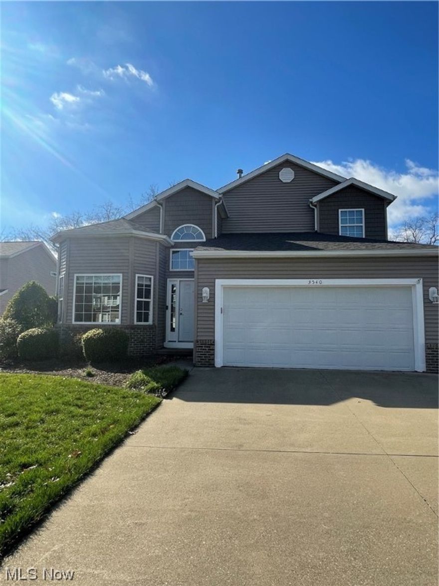 Beautiful single family home is Move In Ready! This spacious home is full of windows that let in not only the bright natural light but amazing views of the golf course. The great room and adjoining dining room has plenty of room for entertaining and boasts new luxury vinyl plank flooring and vaulted ceilings. Kitchen and breakfast room is a home chefs dream. The 4 season room can be used as an office or den and has french pocket doors to close it off from the great room and another set of doors to walk out to the deck, patio and private back yard. The master suite has a large walk in closet and a spacious master bath complete with a large soaking tub, walk in shower, dual vanities and separate water closet. The main floor also has a cute guest bath, first floor laundry and access to the oversized garage which has built in storage  shelves. The second floor has 2 additional bedrooms, a full bath and a large loft area. You will be amazed with the lower level of this home and its recreation room as well as all of the additional bonus rooms. Call today and make an appointment to see all this home has to offer. Located in the highly sought after Green Local School district and near by country clubs, and quick access to Canton, Akron, Cleveland via nearby I77 and the Canton Akron Airport.