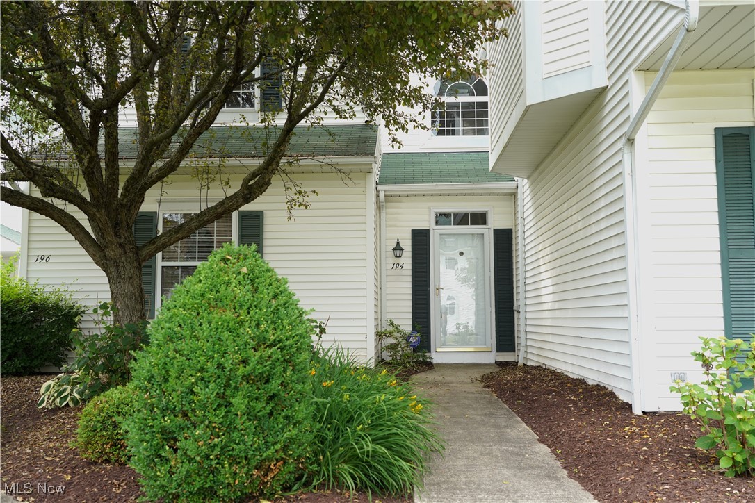 Beautifully Updated 2-Bed, 2-Bath Condo in Desirable Golf Community. Welcome to this spacious and impeccably maintained second-floor condo featuring 2 bedrooms, 2 full baths, and an attached 2-car garage. Enjoy soaring vaulted ceilings in both the family room and primary bedroom, enhancing the open, airy feel of this beautiful home. The inviting family room offers a cozy ambiance with a double-sided gas fireplace that flows seamlessly into the eat-in kitchen. High-end updates abound in the kitchen, including a Samsung White Glass Smart Refrigerator (2023), Samsung White Glass electric range with smart dial and built-in air fryer (2022), and upgraded microwave (2023). Retreat to the spacious primary suite complete with a walk-in closet, vaulted ceiling, and a full private bath. The generously sized second bedroom offers dual closets, perfect for guests or a home office. Carpet was just installed in 2025, and ceiling fans are featured throughout for year-round comfort. Elegant touches like wood blinds, roman shades, and transom windows in the family room and kitchen add charm and natural light. Step out onto your private balcony (replaced in 2019) or enjoy the amenities of this golf course community, including a clubhouse and nearby shopping and dining options. Additional updates include baths, roof replaced (2012), Carrier A/C (2020), furnace (2021), and water heater (2023). This move-in ready condo offers low-maintenance living with all the upgrades you’ve been looking for—don’t miss your chance to call it home!