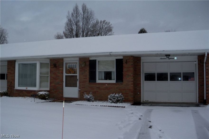 One floor condo located in a desirable development.  Close to hospital and shopping.  Kitchen includes all appliances even a stackable washer/dryer.  Large living room with bay window.  Two large bedrooms.  Handicap assessable bathroom.  Sun Room has large storage closet.  Oversized 1 car attached garage.  No more worries mowing or removing snow!  Affordable Association Fee.