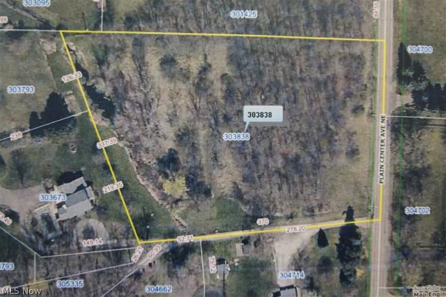 1.94 acre wooded lot in the Plain LSD. 276 feet of frontage on Plain Center. Public Water & Public Sewer.