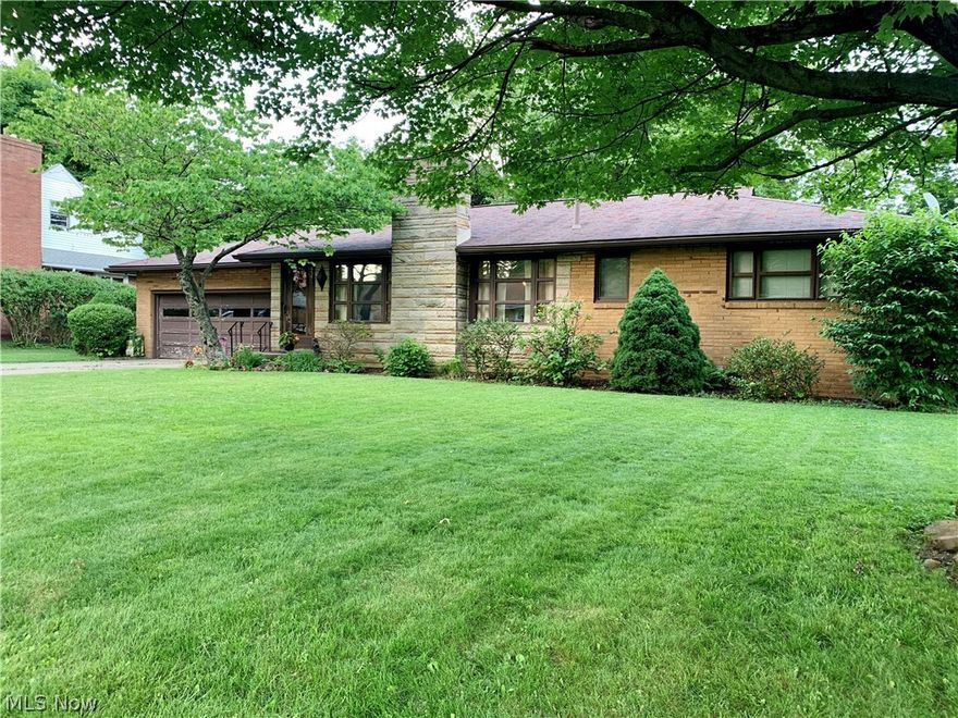 Beautiful spacious all brick ranch home located in Plain Twp. This ranch home offers 3 bedrooms 2.5 baths with tons a space for entertaining with it's multiple living/great rooms on the main level. Walking in the front door you will find a large living room with the first of 2 fireplaces. The main living room then spills into the dining room, kitchen, and great room where the second fireplace is located. The great room was a very well built addition with an entire wall of windows open to the backyard. The other side of the main living room is a hallway where the main level full bath is located along with the 3 large bedrooms. The living room, hallway, and all bedrooms have hardwood floors under the carpet. The basement is partially finished with a huge recreation room offering another 520 sqft of living space. The other side of the basement is a large utility room used for storage and is where the laundry hook ups are located. The second full bathroom is located in the basement as well