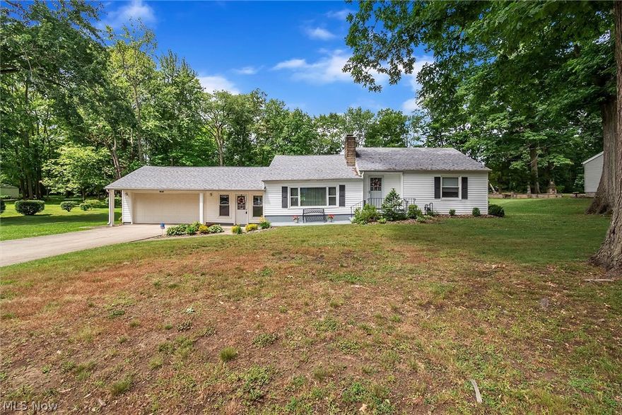 Welcome to this very well maintained Ranch home that has been owned by the same owners over 30 years. Located on a double lot, this home sits on almost an acre of land with a huge backyard. The cozy breezeway that connects this home with the 2 car garage is great for fun summertime gatherings. The huge living room w/fireplace is just one of 2 living room areas to enjoy. The kitchen is right off of your formal dining which connects with both living rooms. This is  great for the holidays. All 3 bedrooms are very spacious with a ton of closet space. Updates in this home include: new electrical box (2019), hot water tank (2020), central air (2016), some newer windows along with newer glass block windows in full basement. Extra storage also in walk up attic, nice additional shower in basement that has just been freshly painted. Other features include additional shed to store tools etc and nice deck off of living room. Don't miss out.